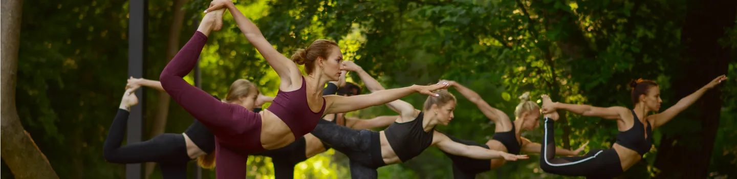 Yoga practitioners showcasing the health benefits of the Sri Sri Yoga Level 2 program